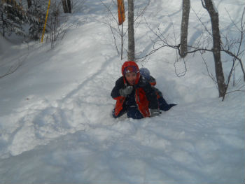 kid playing in snow